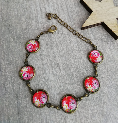 Bracelet bronze  petits cabochons Fleurs fond rouge